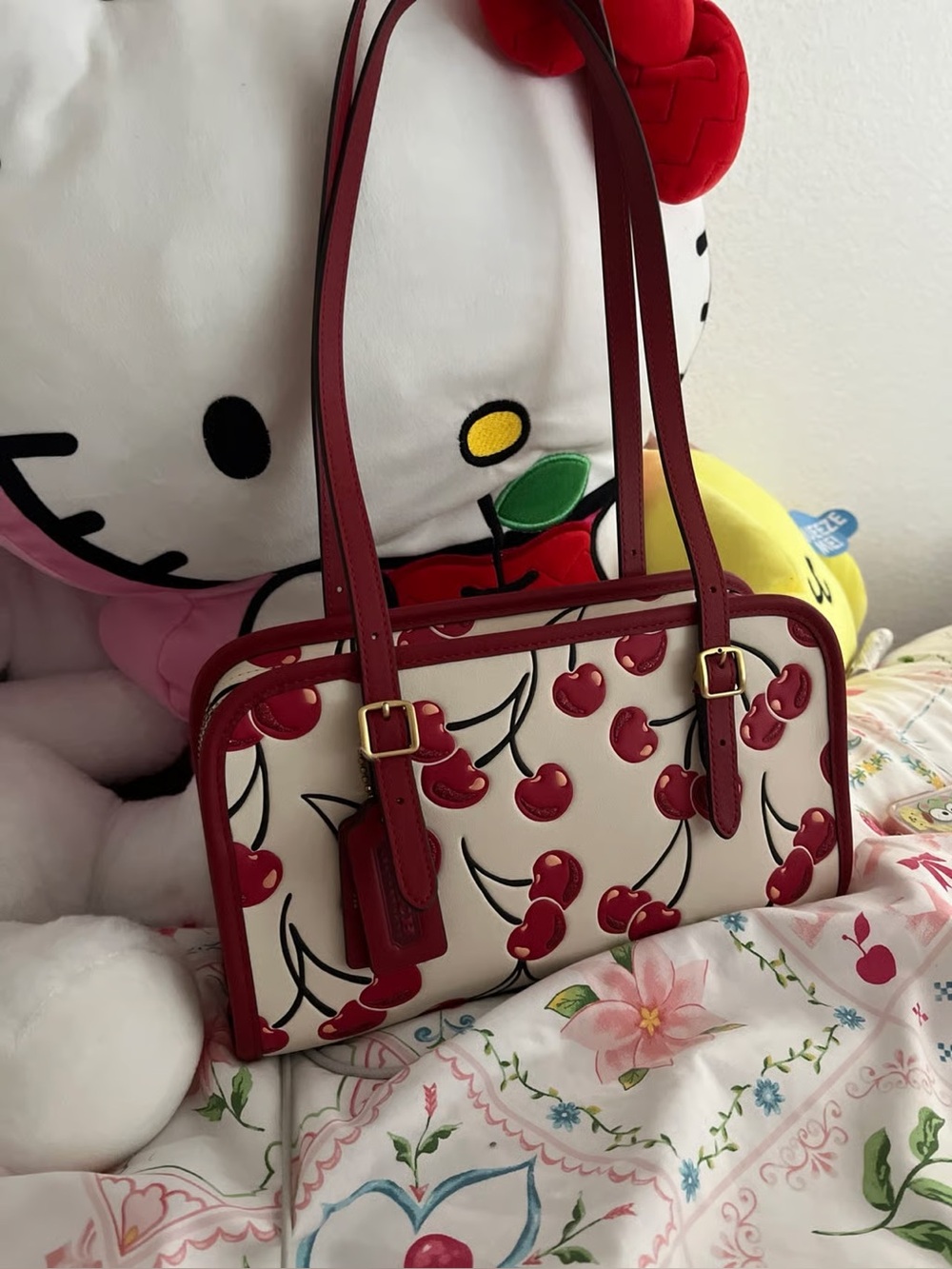 coach cherry swing zip